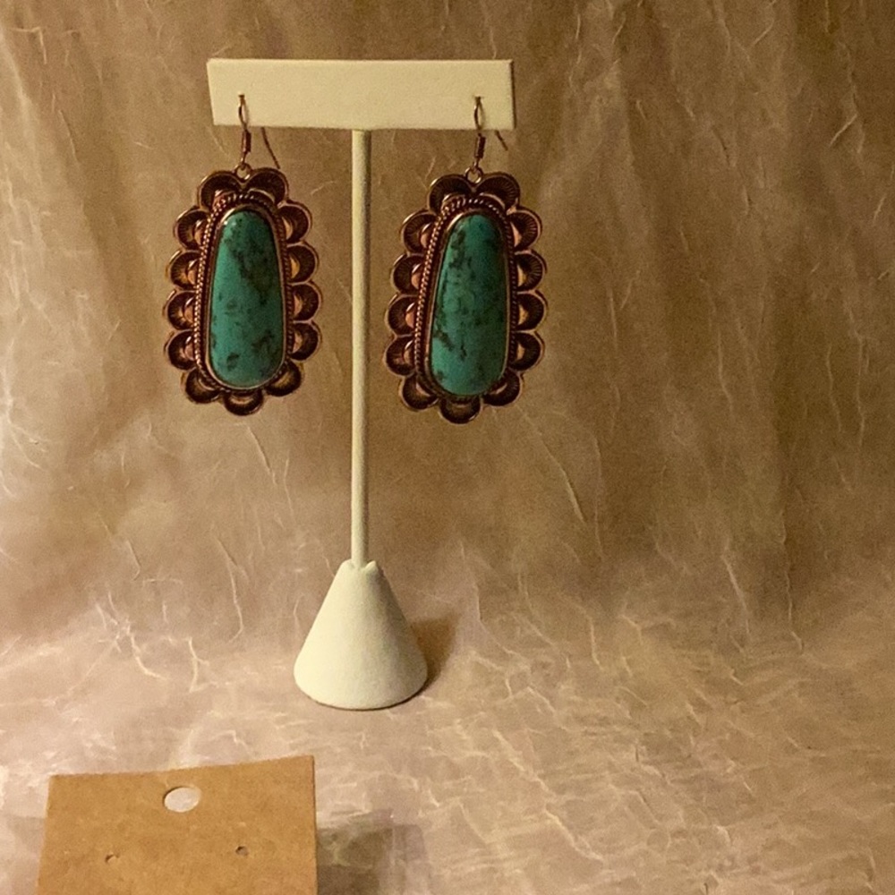 New in package Rose gold metal earrings w/faux Turquoise on fishhooks